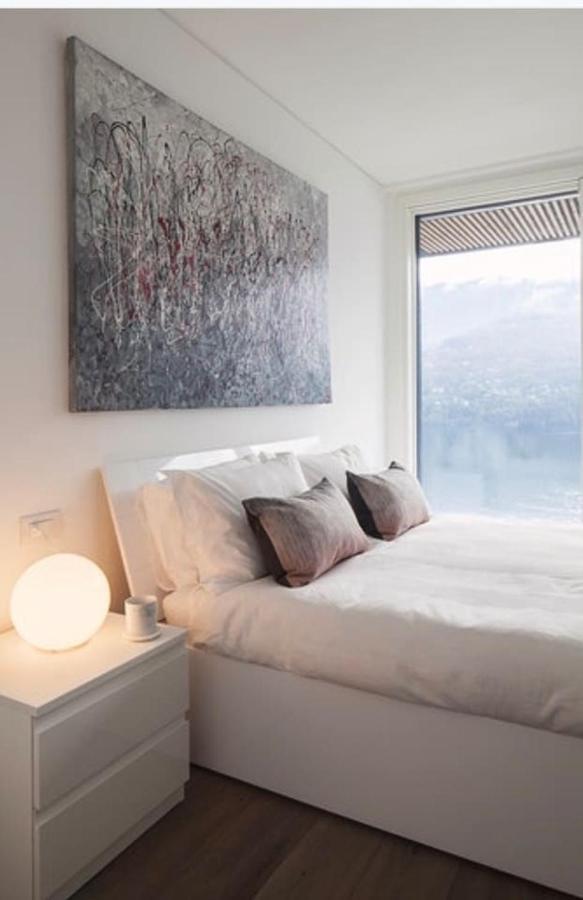 شقة Ulivi Luxury Loft & Pool - The House Of Travelers Carate Urio المظهر الخارجي الصورة